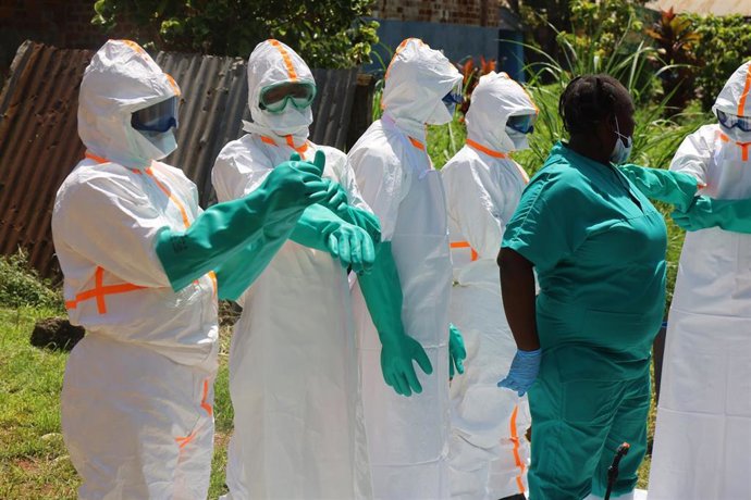 KINSHASA, May 27, 2026  -- Medical workers wear protective suits before disinfecting work in Mongbwalu, Ituri province, the Democratic Republic of the Congo, May 24, 2026. The Ebola outbreak in the Democratic Republic of the Congo (DR Congo) remains at an